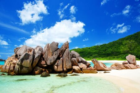 Anse Cocos beach with big granite stones in La Digue Island, Indian Ocean, Seyshelles.の写真素材