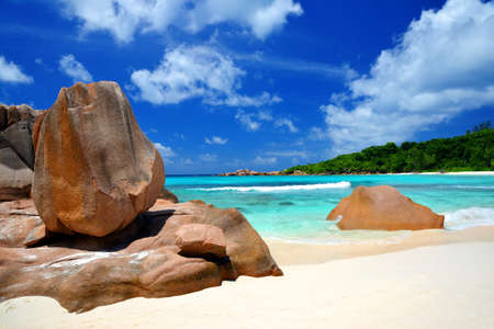 Anse Cocos beach with big granite stones in La Digue Island, Indian Ocean, Seychelles.の写真素材