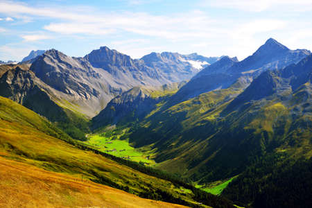 View from the top of mountain Jakobshorn above Davos town, Albula Alps,Canton of Grisons, Switzerland. Alpine landscape in sunny day.の写真素材