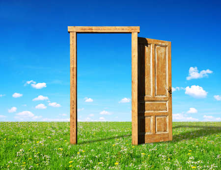 Open the door on spring meadow. New life concepts.の写真素材