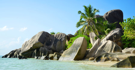 Beatiful beach Anse Source d'Argent with big granite rocks in sunny day. La Digue Island, Seychelles.の写真素材
