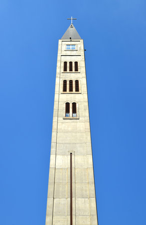 MOSTAR, BOSNIA AND HERZEGOVINA - AUGUST 28, 2019: The bell tower of the Franciscan Church of Peter and Paul, Mostar, Bosnia and Herzegovina.のeditorial素材