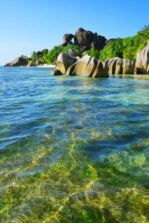 Beatiful beach Anse Source d'Argent with big granite rocks in sunny day. La Digue Island, Seychelles.の写真素材