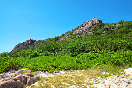 Granite rocks close to Anse Pierrot beach. La Digue Island, Seychelles. Tropical destination in Indian Ocean.の写真素材