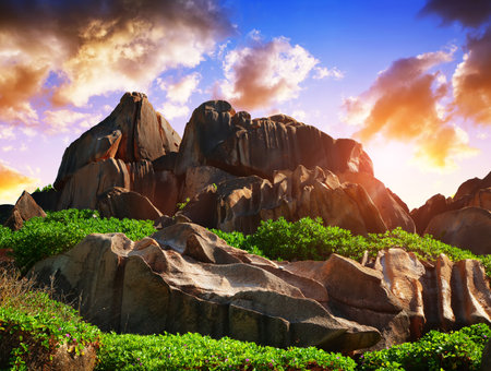 Big granite rocks close to Anse Songe beach at sunrise. La Digue Island, Indian ocean, Seychelles.の写真素材