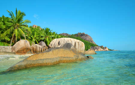 Beatiful beach Anse Source d'Argent with big granite rocks in sunny day. La Digue Island, Seychelles.の写真素材