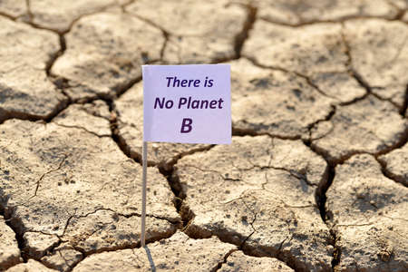 There is no planet b banner on arid cracked soil. Concept of climate change or global warming.の写真素材