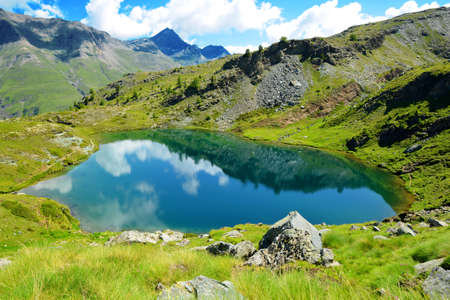 Mountain lake Lago di Loie in Gran Paradiso National Park, Lillaz, Cogne, Aosta valley, Italy. Summer landscape in the Alps.の写真素材