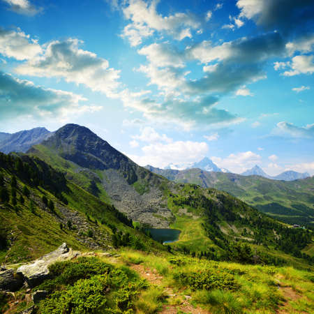 View on the mountain lake Lago di Chamole, Aosta valley, Italy. Summer landscape in the Alps.の写真素材