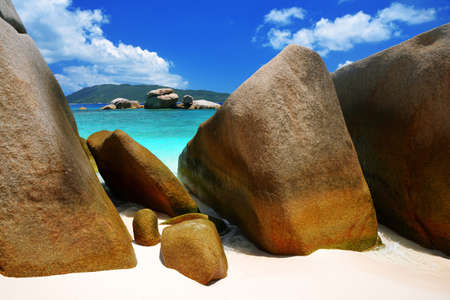 Tropical beach with big granite boulders on Coco Island, Indian Ocean, Seychelles. Exotic destinations.の写真素材