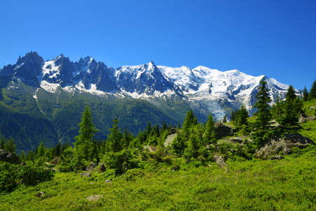 Idyllic landscape with Mont Blanc mountain range in sunny day. Nature Reserve Aiguilles Rouges, Graian Alps, France, Europe.の写真素材