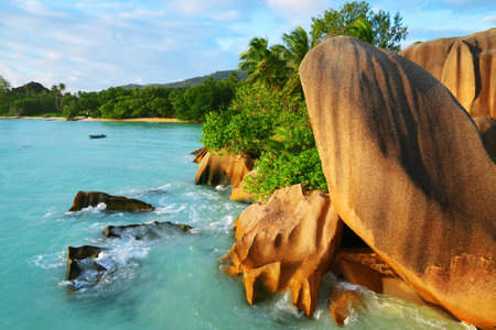 Anse Source d'Argent beach with big granite rocks at sunset. La Digue Island, Indian Ocean, Seychelles. Tropical destination.の写真素材