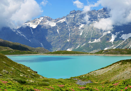Mountain lake Lac de Goillet, Aosta valley, Italy. Summer landscape in the Alps.の写真素材