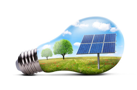 Eco LED light bulb with solar panel isolated on white background. Concept of green energy.の写真素材