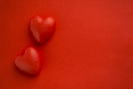 Red background with red hearts, there is a place for text.. Happy moments. Valentines day backgroundの写真素材