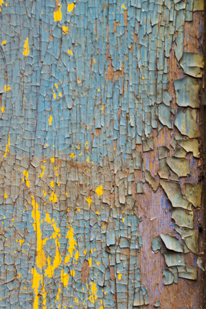Rusty old wooden wall painted blue. Detailed photo texture. Blue paint peeling, cracked.の写真素材