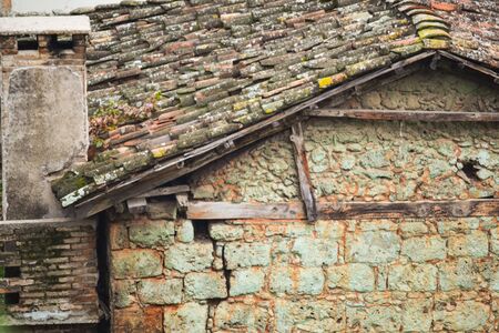 Exterior in grunge style. A collapsing house. The architecture of old Antalya, Turkey. City...