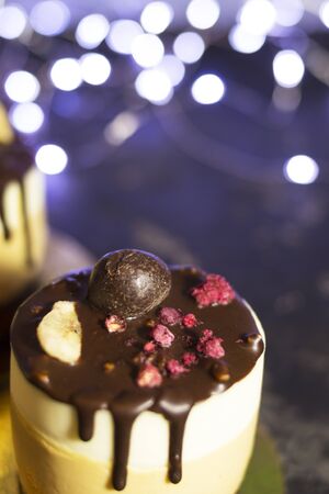 Mousse cake on the shelves at the party. Time to have fun. Selective focus and blurred background. The concept of cooking and holiday treats.の写真素材