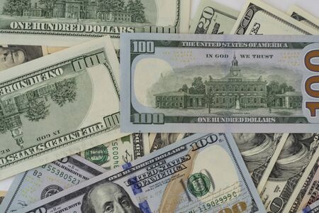 Background with money of american hundred dollar and other notes. Business concept, and monetary...