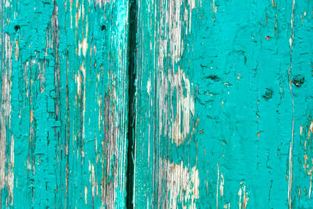 Old rustic painted cracky green, turquoise wooden texture or background.の写真素材