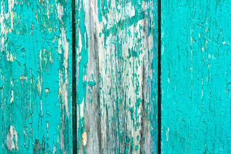 Old rustic painted cracky green, turquoise wooden texture or background.の写真素材