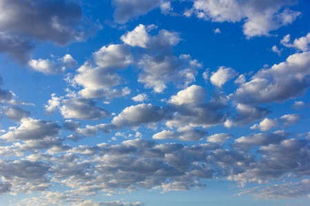 Blue sky with white and gray clouds.の写真素材
