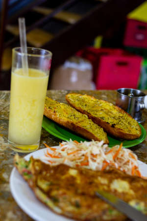 Garlic bread and omelet and salad breakfast. Vietnamese cuisineの写真素材