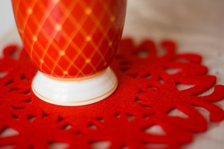 red circle stands on a red napkinの写真素材