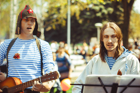 telnyazhkah two musicians sing in the streetの写真素材