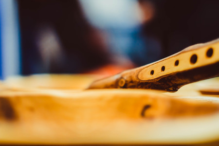 a wooden bowl standing on the counterの写真素材