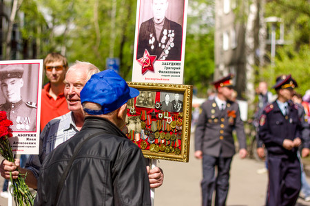 Russia, Siberia, Novokuznetsk - may 9, 2014: the passage of the immortal regiment on the main street of the cityのeditorial素材