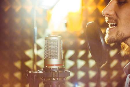 the guy singing in the Studio long hair and beardの写真素材
