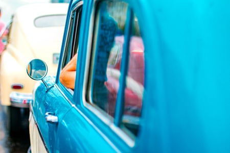 The blue door of an old Soviet carの写真素材