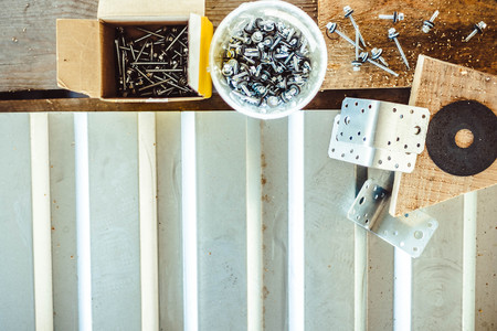 Closeup of roofing screw and screw for metal work on white backgroundの写真素材