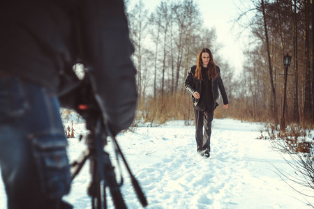 A guy is filmed in the winter goes on snowの写真素材