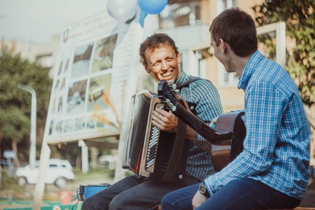 Russia, Novokuzneck - 7.04.2013: musicians sing in the courtyard in Russiaのeditorial素材