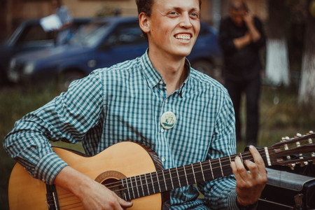 Russia, Novokuzneck - 7.04.2013: musicians sing in the courtyard in Russiaのeditorial素材