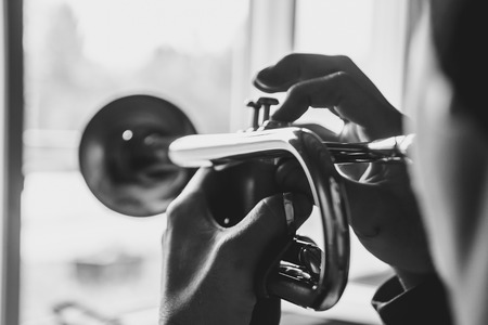 trumpeter plays the trumpet at home musicianの写真素材