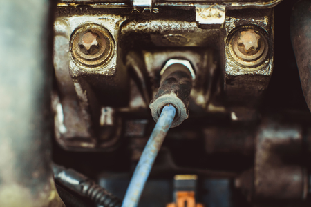 A close up shot of the engine of an old carの写真素材