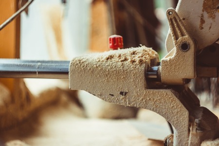 Tools in the workshop. Sawdust on the desktop. Lathe work