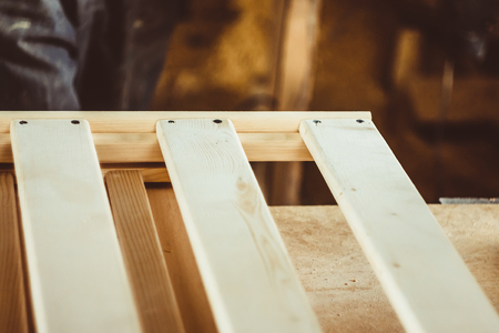 Board products are in the workshop of a carpenterの写真素材