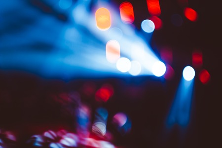 Stage lights on concert. Lighting equipment with multicolored beams.の写真素材