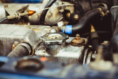 A close up shot of the engine of an old carの写真素材