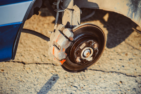 Closeup disc brake of the vehicle for repair.の写真素材
