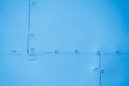 the texture of the Old metal door with rivetsの写真素材