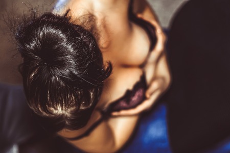 woman top view of the chest in the tattoo parlorの写真素材