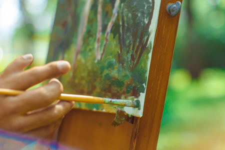 Russia, Novokuzneck, 4.08.2017: Artist paints in natureのeditorial素材