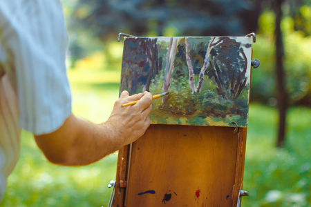 Russia, Novokuzneck, 4.08.2017: Artist paints in natureのeditorial素材