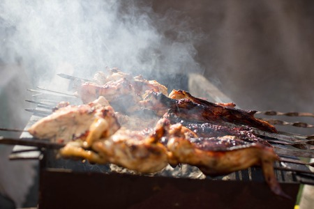 Kebab, steak, chicken roasted on charcoal grillの写真素材