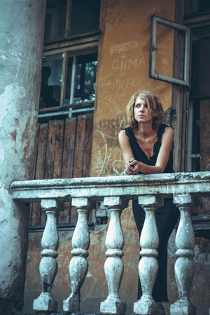 girl in black dress standingの写真素材